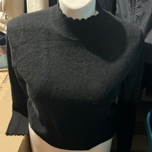 Nanette lepore 2ply cashmere black sweater. Lovely scalloped neck/sleeves.